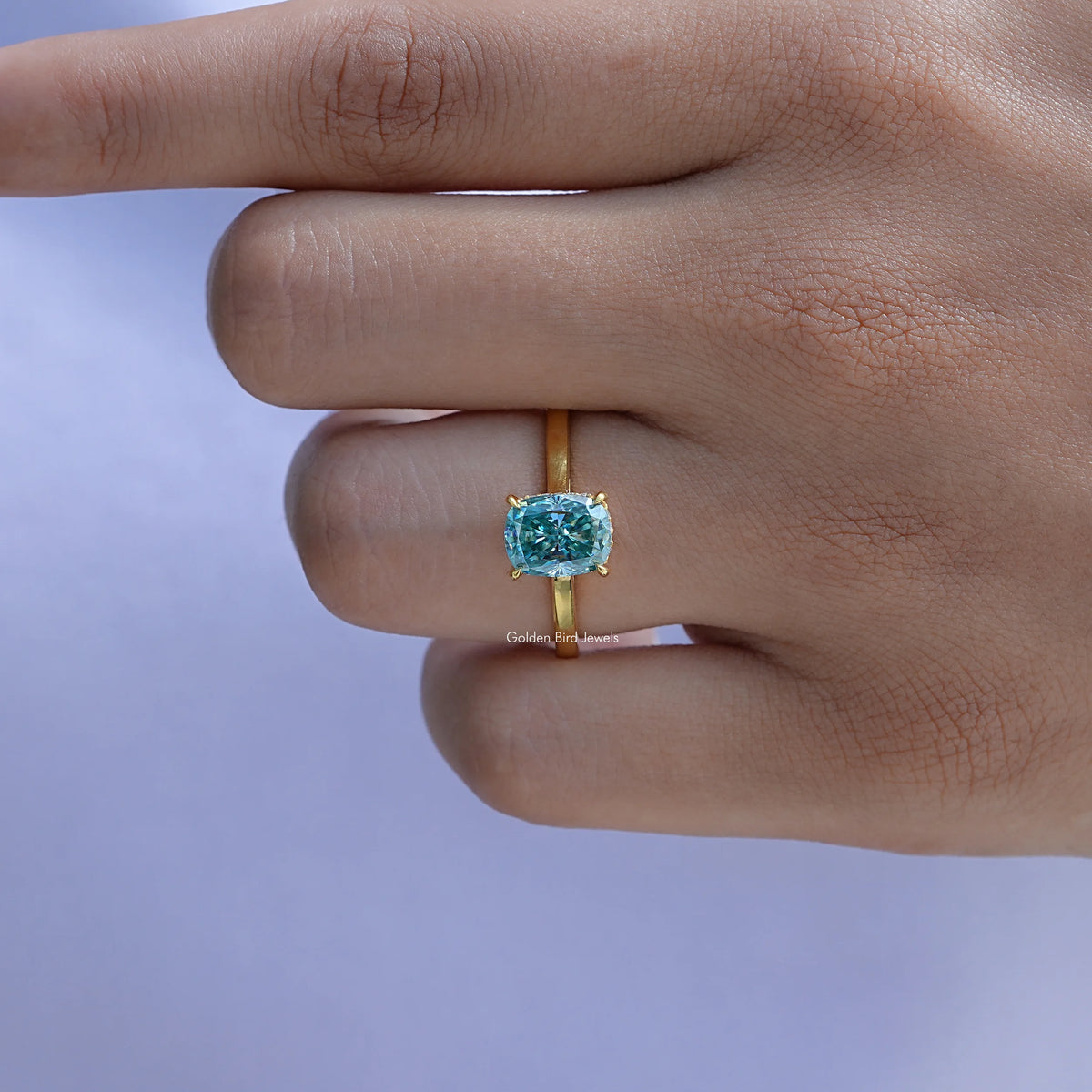 Blue Cushion Cut Moissanite Engagement Ring In Yellow Gold