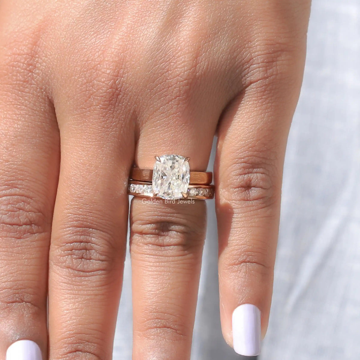 Close-Up View of Moissanite Cushion Cut Bridal Ring Set In Yellow Gold