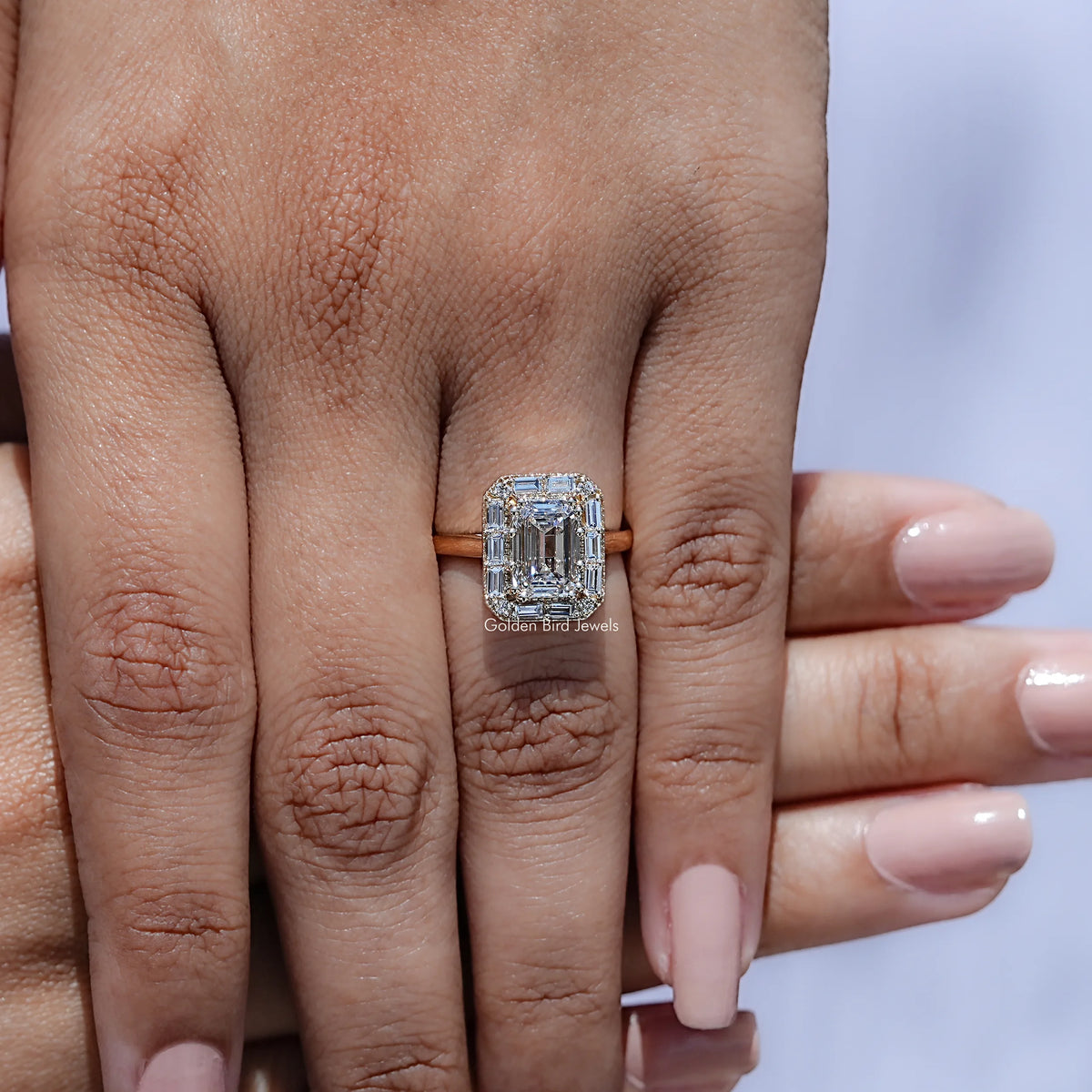 View of Emerald Shaped Solitaire Moissanite Ring in prongs setting