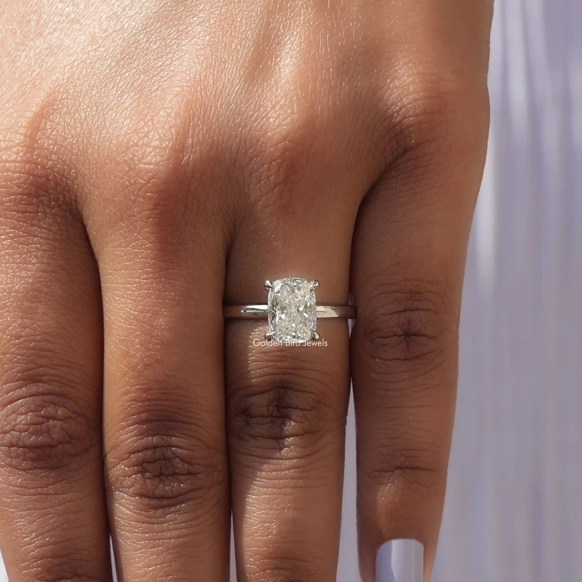 Detailed View Of Cushion Cut Solitaire Engagement Ring In White Gold
