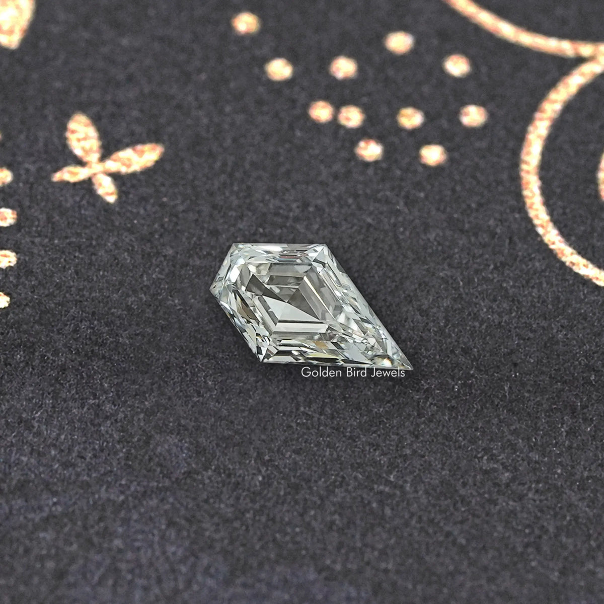 Clear arrow-shaped lab-grown diamond with geometric facets and crisp sparkle