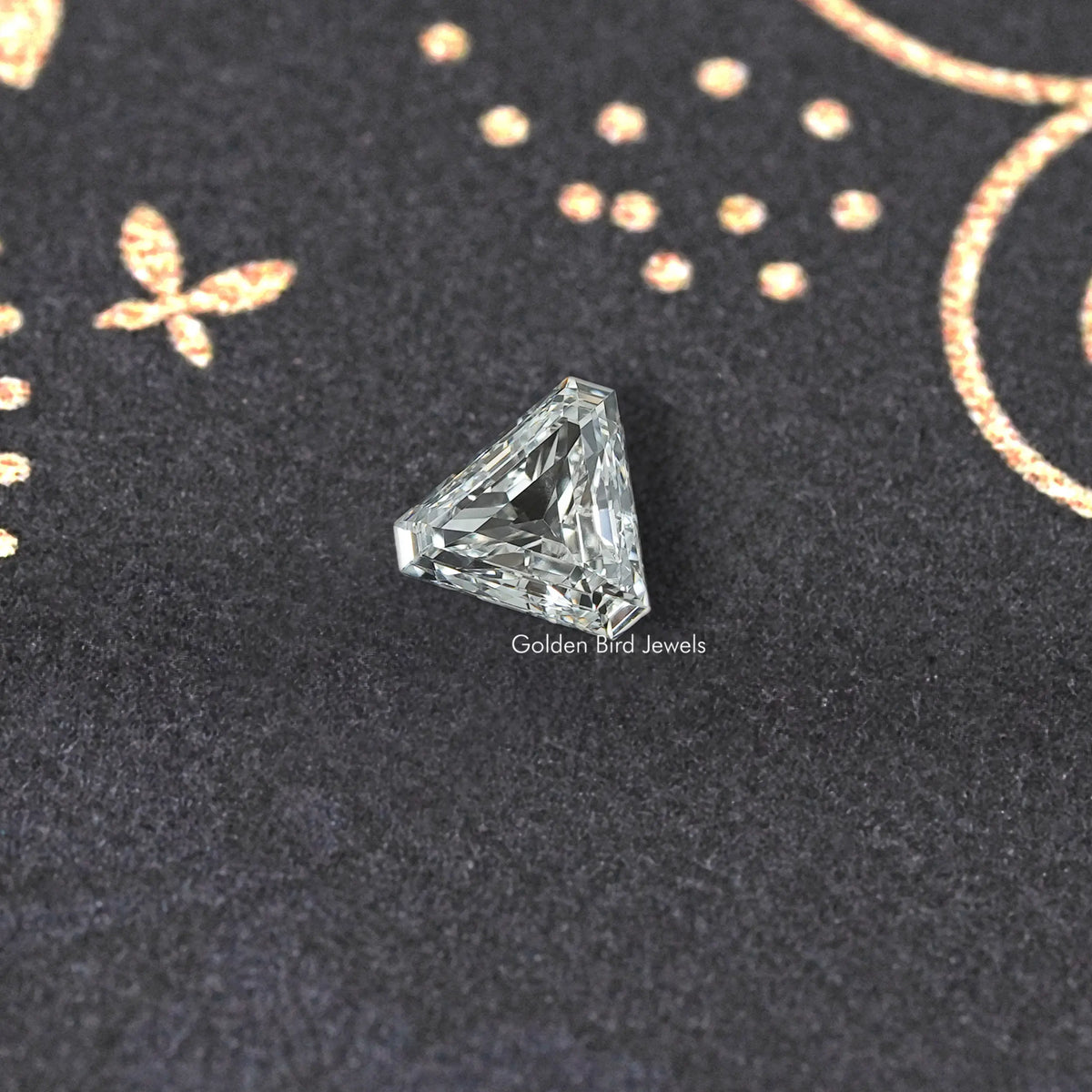 Single modified trillion-cut lab-grown diamond, clear stone in close view