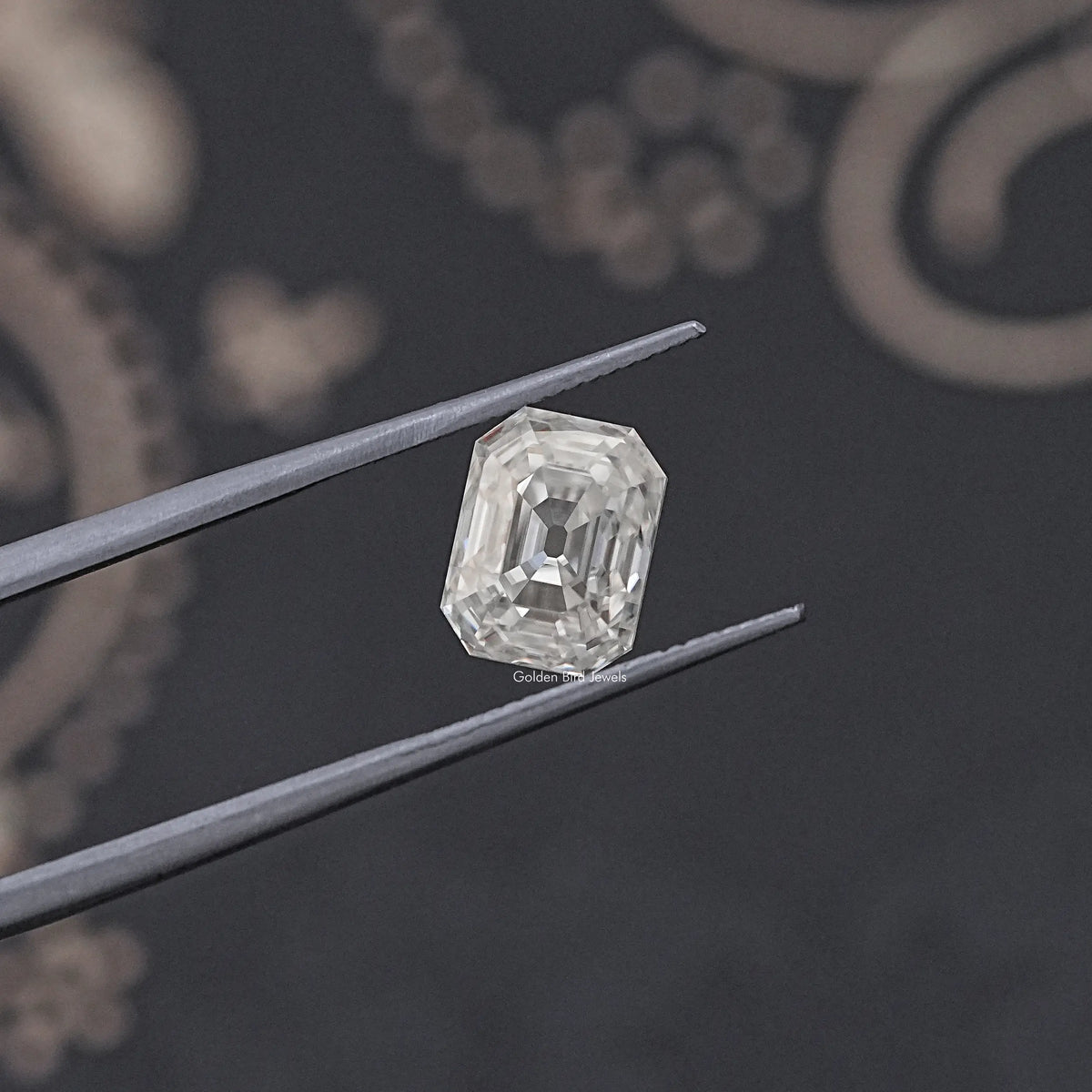 tweezers View of Timeless Old Mine Cut Emerald Moissanite Loose stone