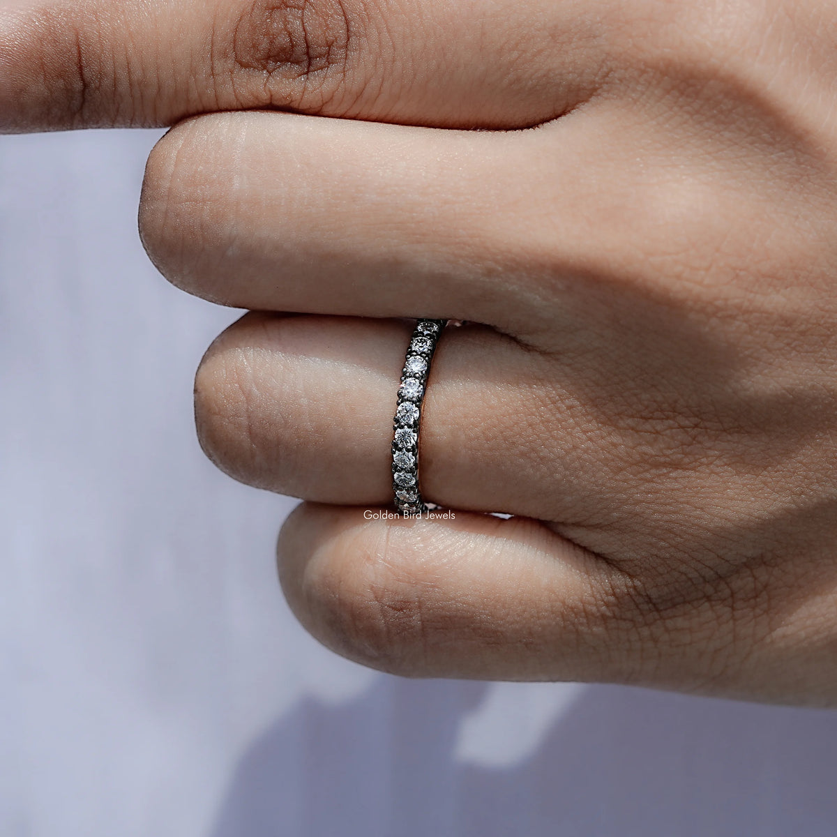 View of Round Cut Moissanite Solitaire Ring in prongs setting