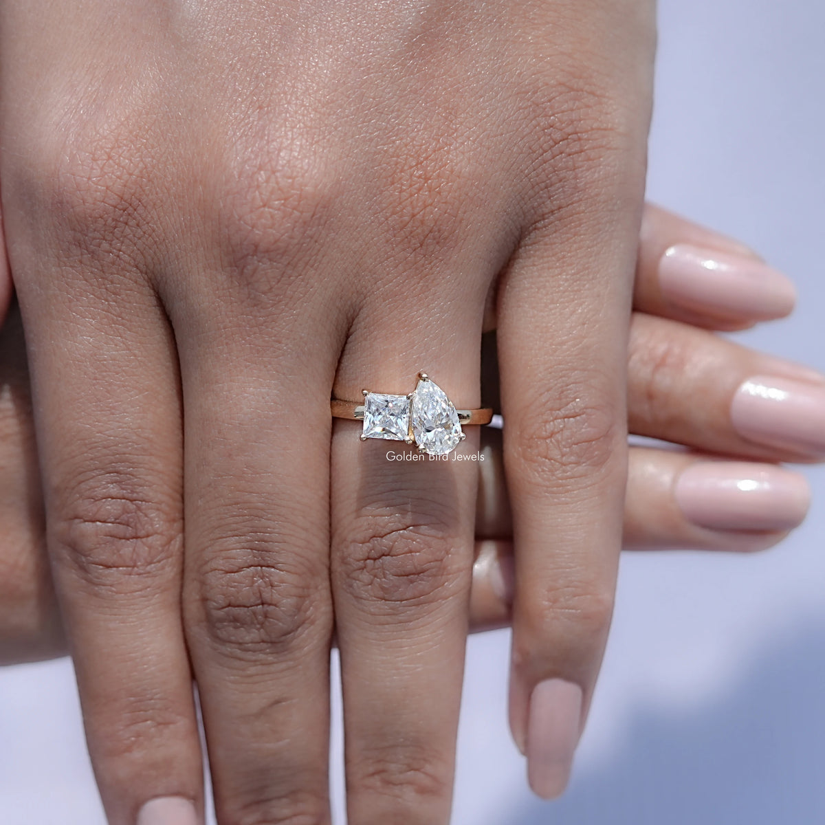 Toi et moi moissanite ring with pear and princess-cut stones