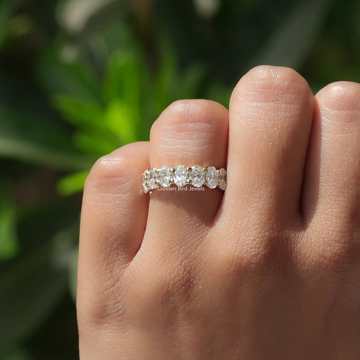 View of Oval Cut Diamond Eternity Wedding Band In White Gold