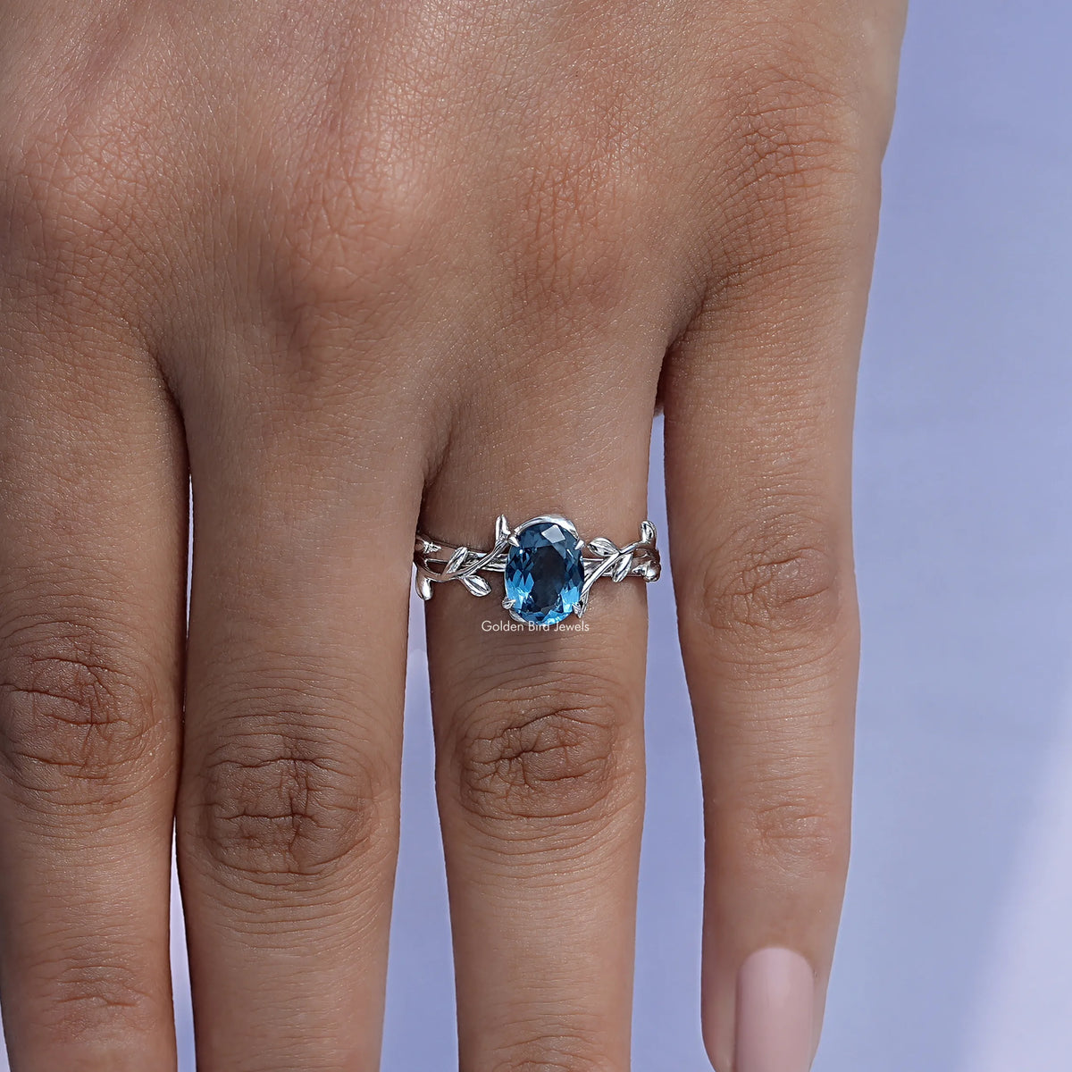 Solitaire Oval Cut Engagement Ring In finger