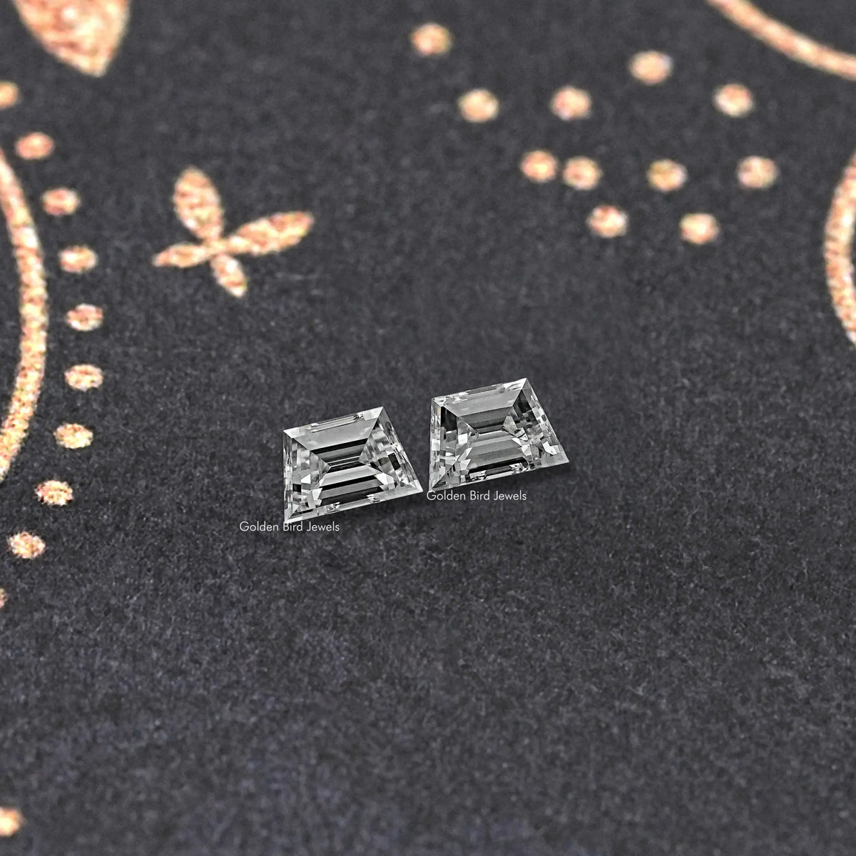 Trapezoid step-cut lab diamond stud earrings pair, horizontal profile with facets