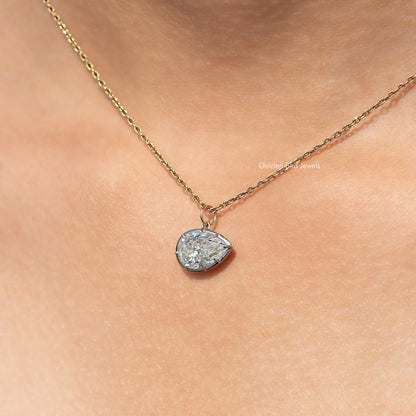 Gold-tone pear-shaped bezel solitaire pendant with moissanite on fine chain