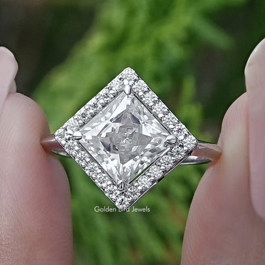 Princess-cut lab diamond halo engagement ring with square center stone and prong-set band