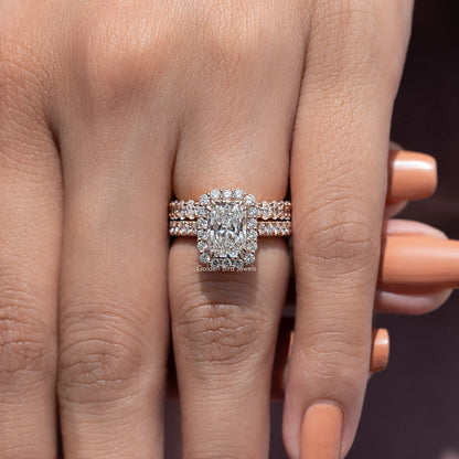 Radiant cut lab diamond halo bridal ring set on a hand