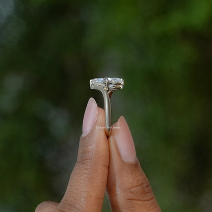Marquise moissanite solitaire ring top view showing rectangular prong setting