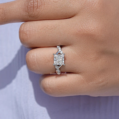 Close-up of 925 sterling silver square-cut moissanite promise ring on finger