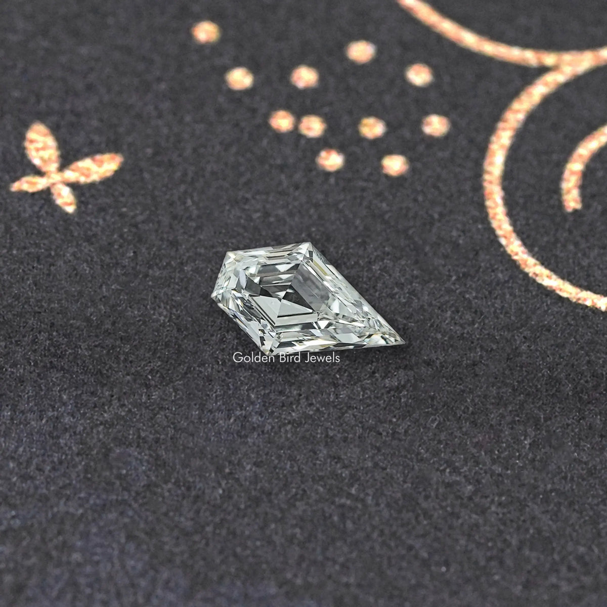 Clear arrow-shaped lab-grown diamond, faceted with sharp prismatic reflections