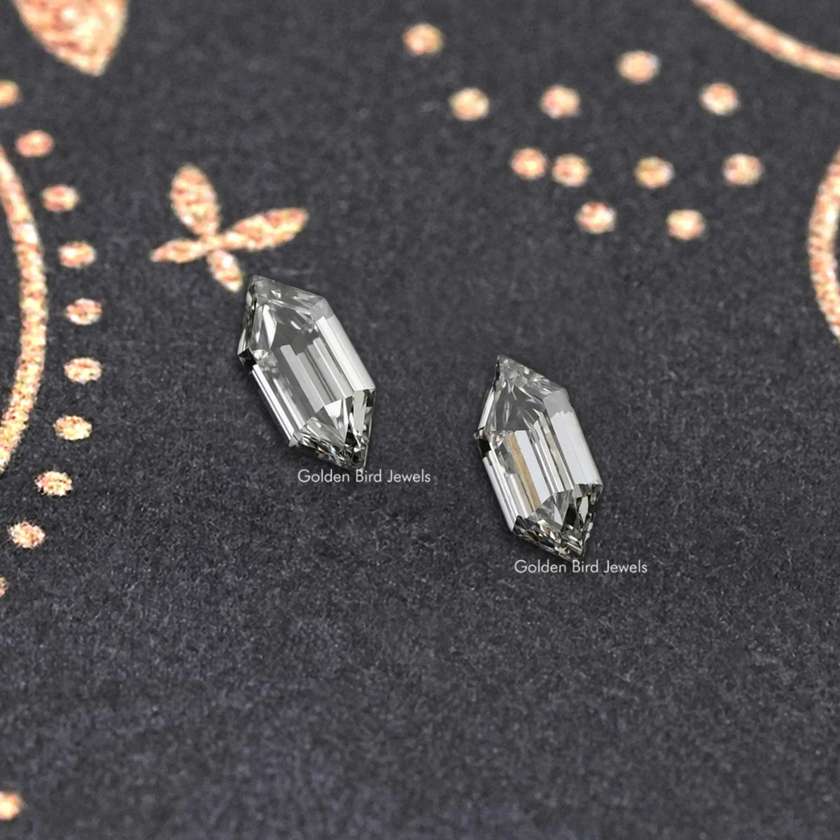 Boat-cut lab-grown diamond stud earrings, close-up angled rectangular stones