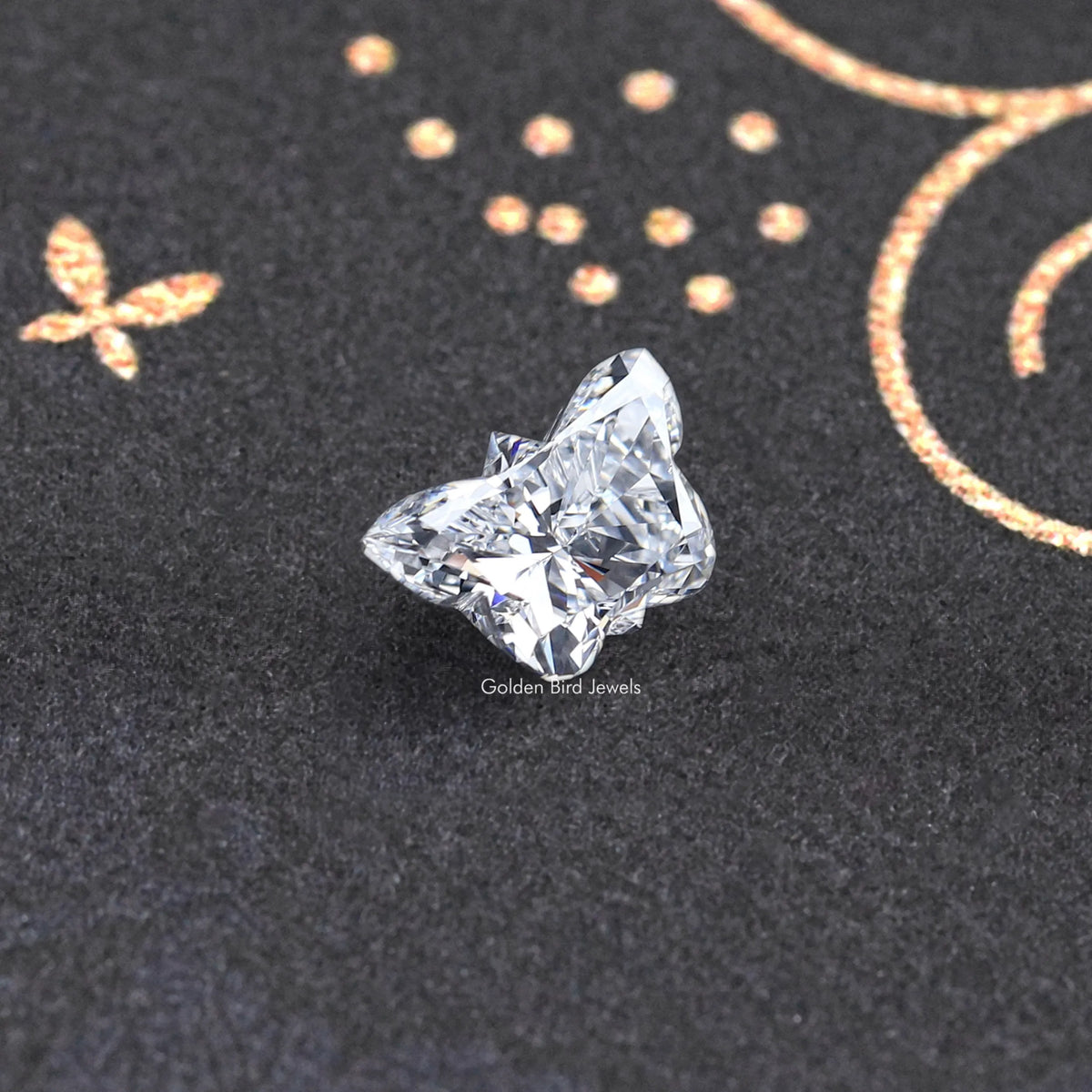 Butterfly-cut lab-grown diamond on dark display, bright princess-style facets
