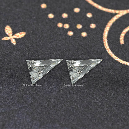 Long triangle lab-cut diamond stud earrings, symmetrical pair of triangular stones
