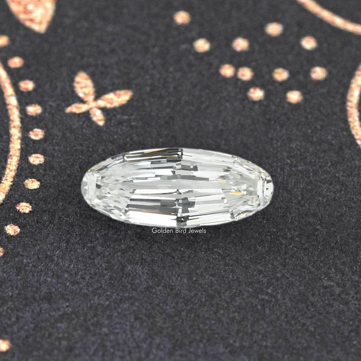 Long oval cut lab-grown diamond, top view with broad facets