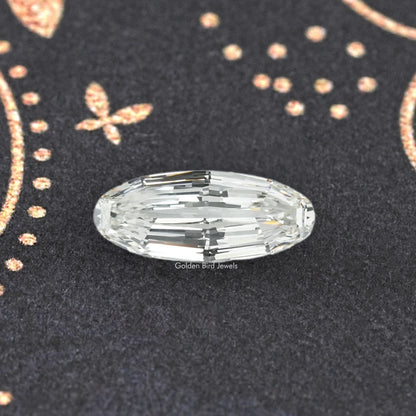 Long oval cut lab-grown diamond, top view with broad facets