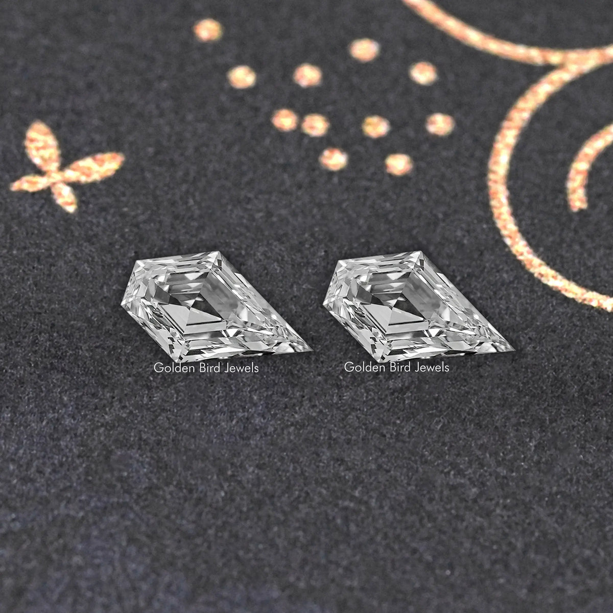 Pair of clear arrow-shaped lab-grown diamonds, two matching faceted stones