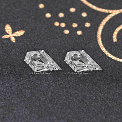 Pair of clear arrow-shaped lab-grown diamonds, two matching faceted stones