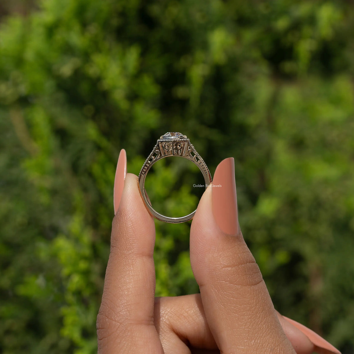 Diamond engagement ring side view showing band profile and prong setting