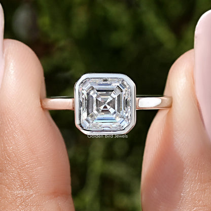 Sterling silver asscher-cut moissanite bezel-set engagement ring, front close-up