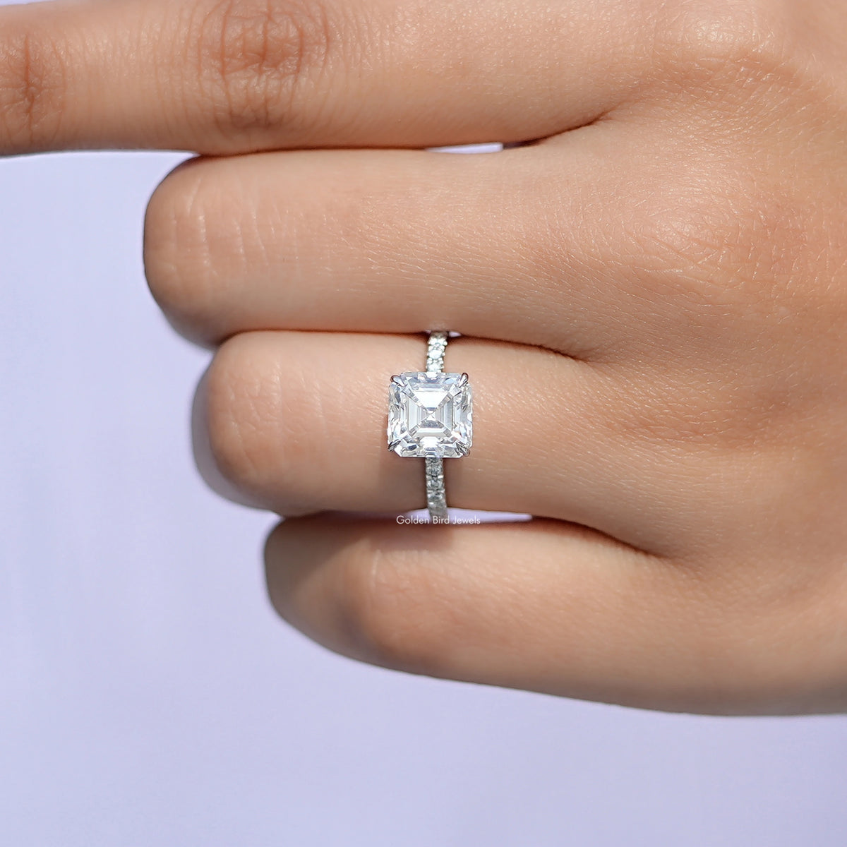 Top View Of Oval And Round Cut Moissanite Toi Et Moi Ring in prongs setting 
