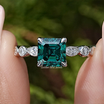 Green Asscher-cut moissanite engagement ring, silver band with halo and side stones