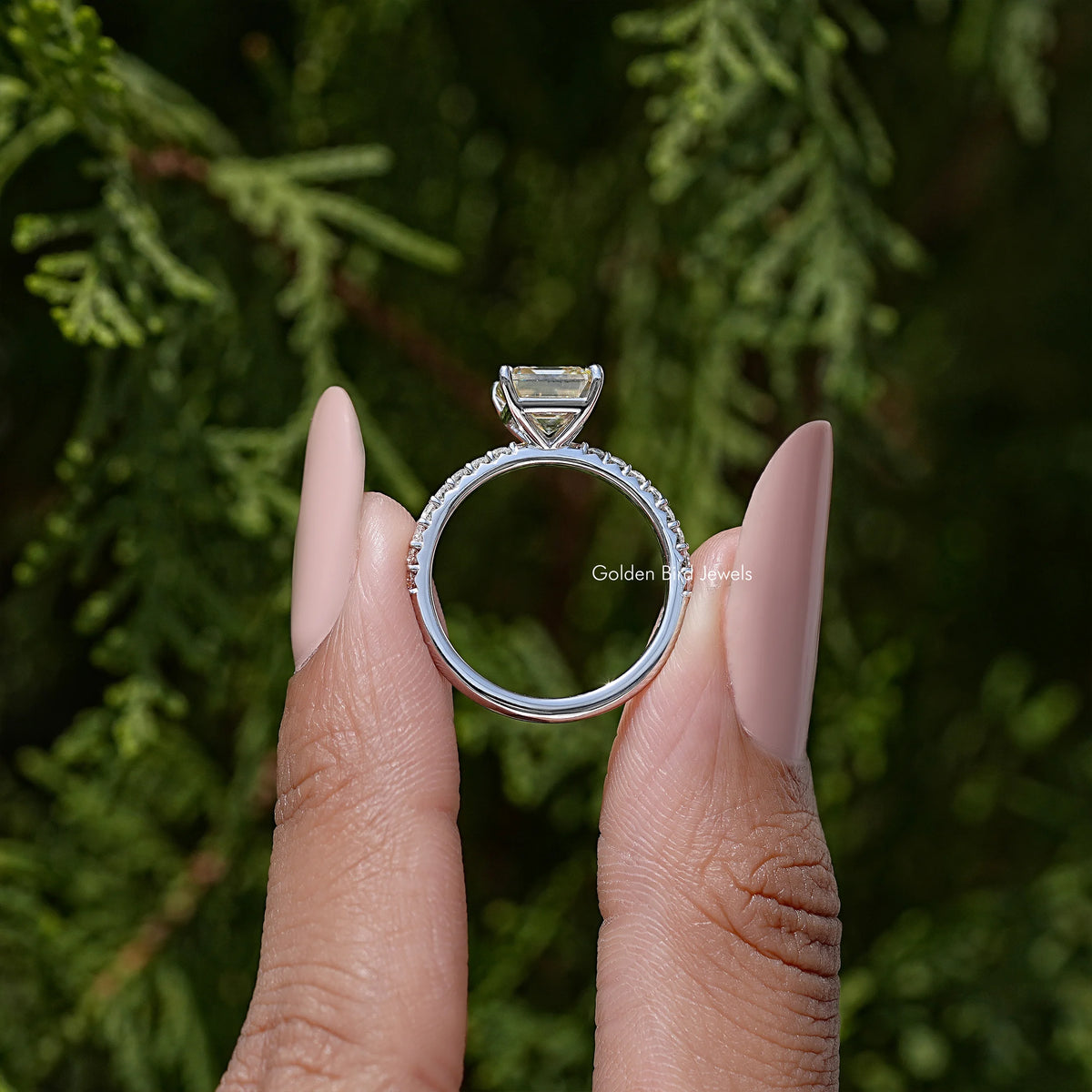 Sterling silver ring with asscher-cut gemstone, oval bezel-like crown detail