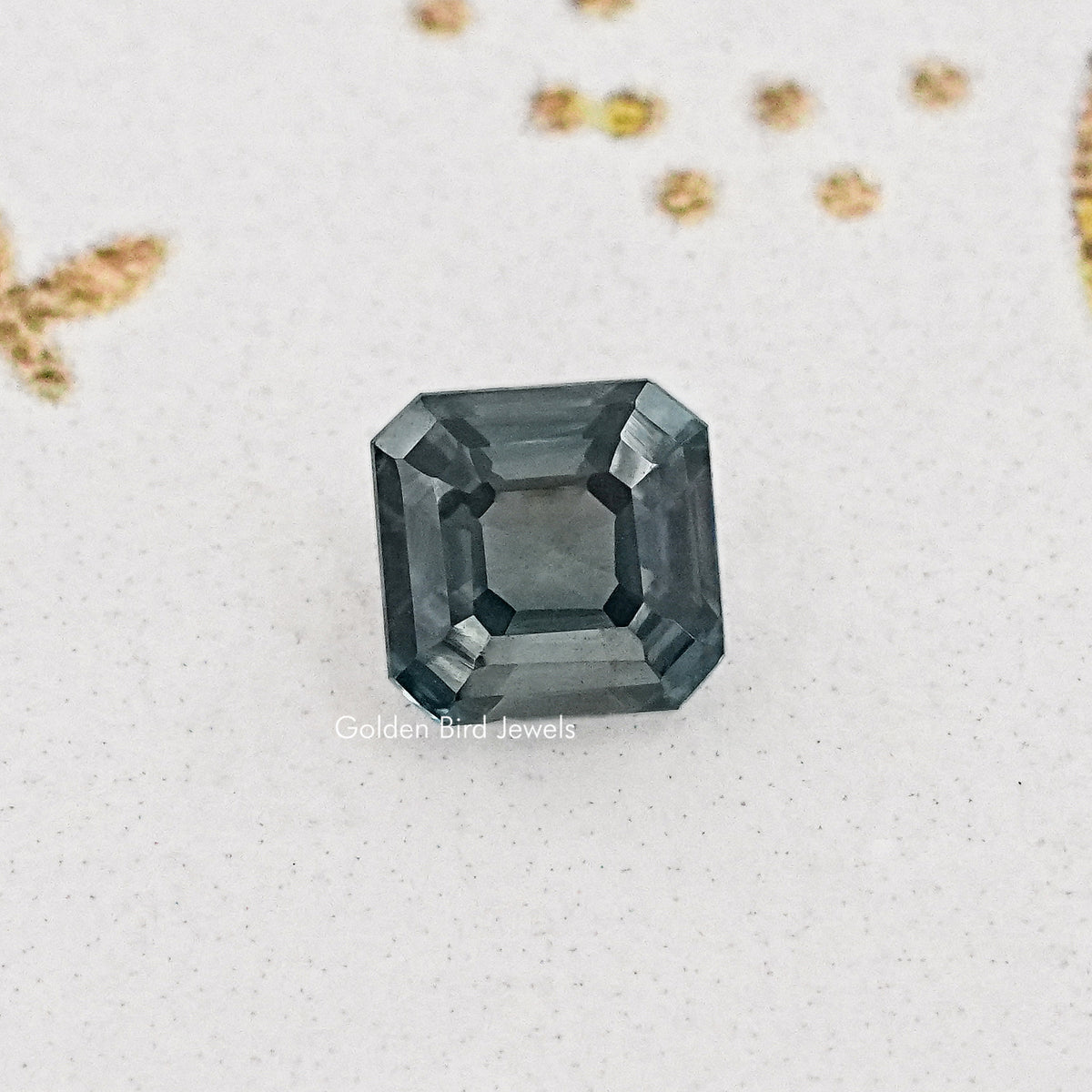 Gray asscher-cut moissanite gemstone, square step facets