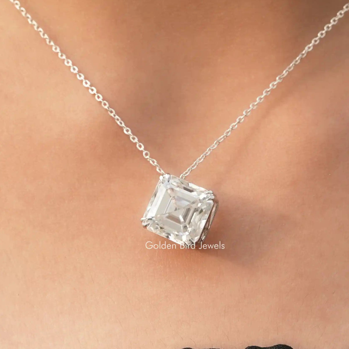 View of colorless asscher moissanite solitaire pendant 
