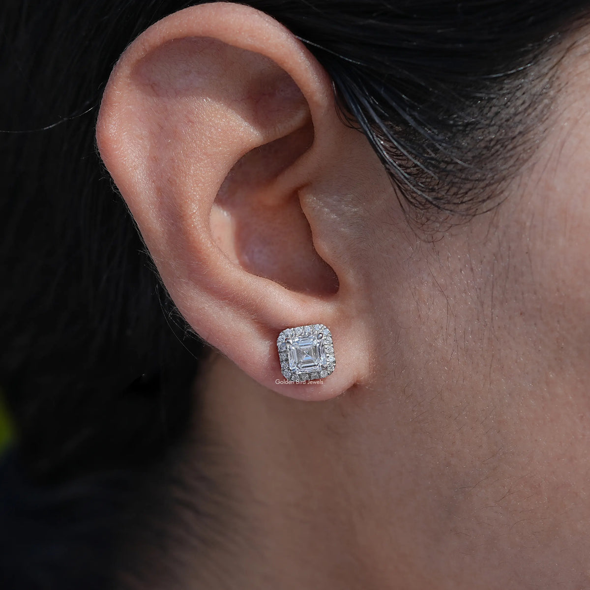 In ear view of asscher cut cluster diamond earrings
