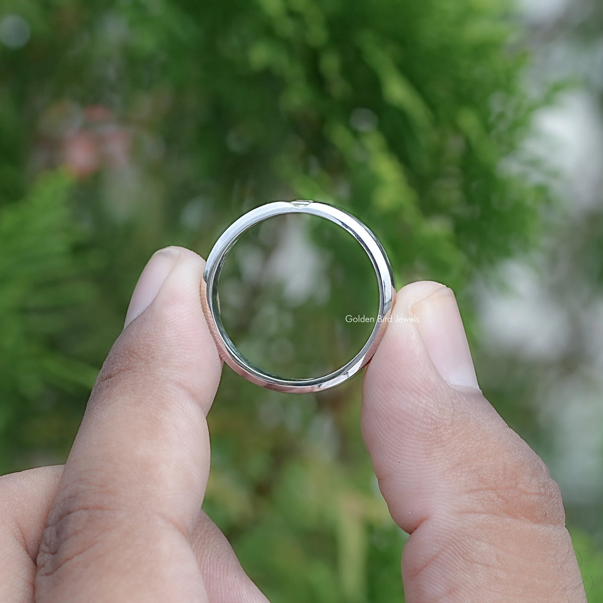 Back view of Baguette Cut Moissanite Solitaire Ring in secure setting 
