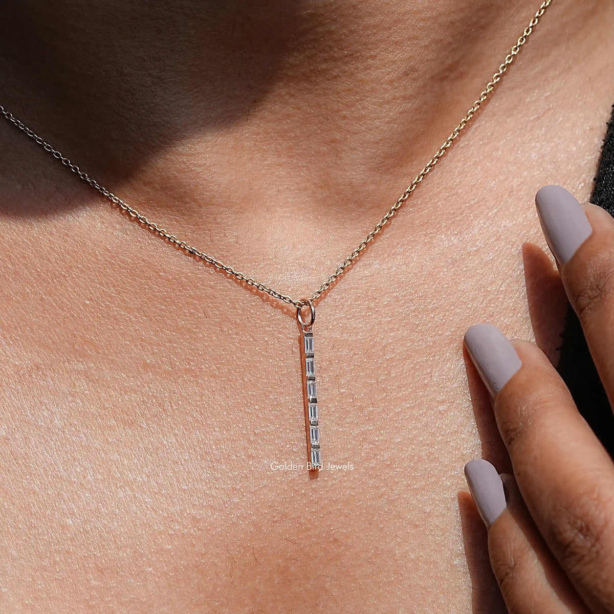 In front view of moissanite Baguette  cut pendant