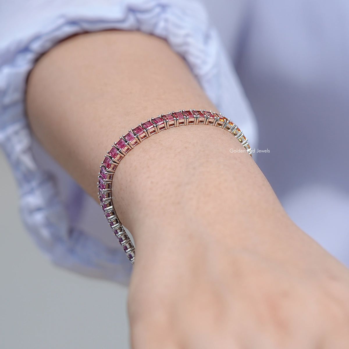 925 silver tennis bracelet with multicolor baguette gemstones, hand wearing