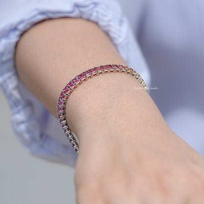 925 silver tennis bracelet with multicolor baguette gemstones, hand wearing