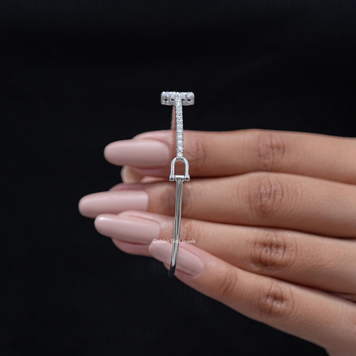 Diamond-encrusted bangle bracelet with rectangular hinge clasp