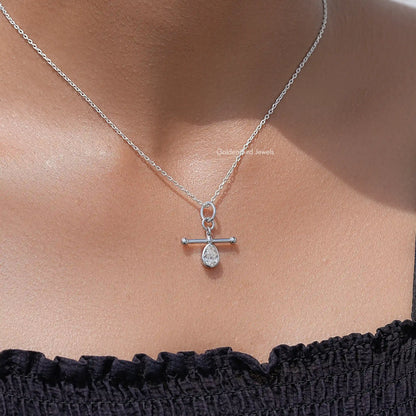 Silver pear-cut bezel pendant necklace with teardrop stone and crossbar bail
