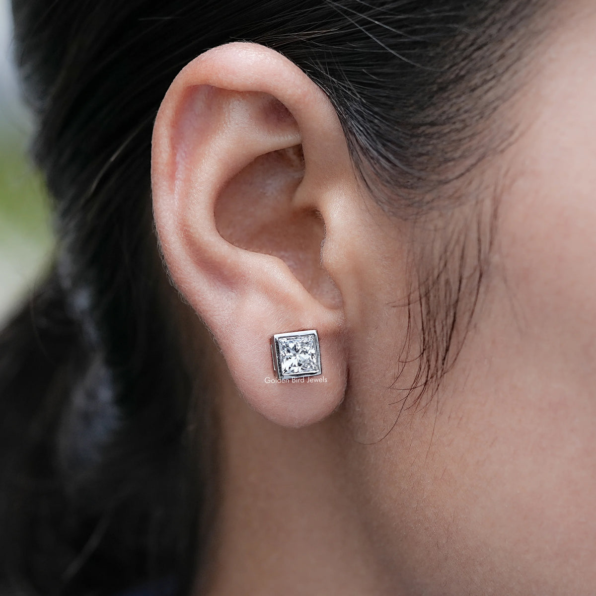 Side View of Lab Diamond Princess Shaped Stud Earrings On Ear