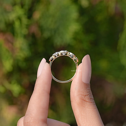 Back View of Bezel Set Round Cut Lab Diamond Ring In two fingers