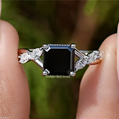 Sterling silver engagement ring with black asscher-cut center stone and side diamonds