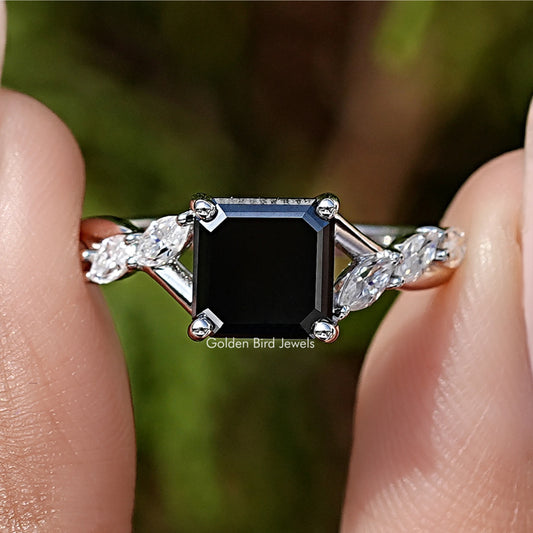 Sterling silver engagement ring with black asscher-cut center stone and side diamonds