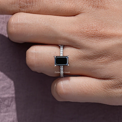 Black emerald-cut moissanite ring with pavé sterling silver band