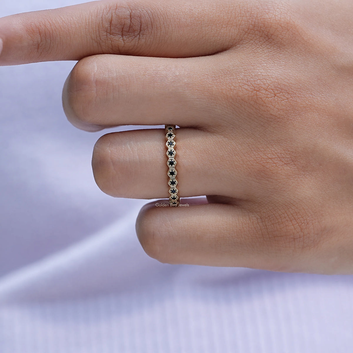 In finger front view of black round cut band