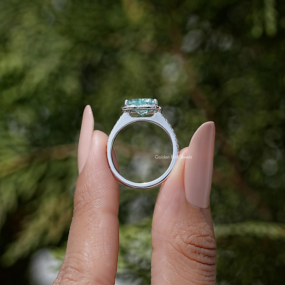 Back view of sterling silver wedding ring with blue heart stone setting