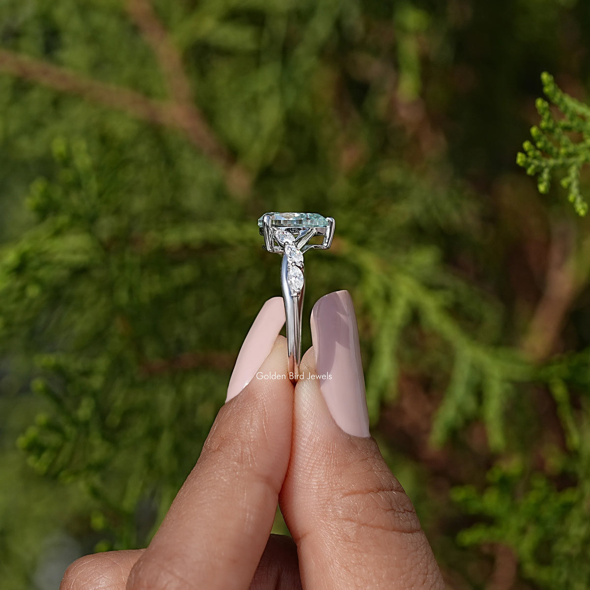 925 sterling silver pear-cut blue moissanite ring with split floral band