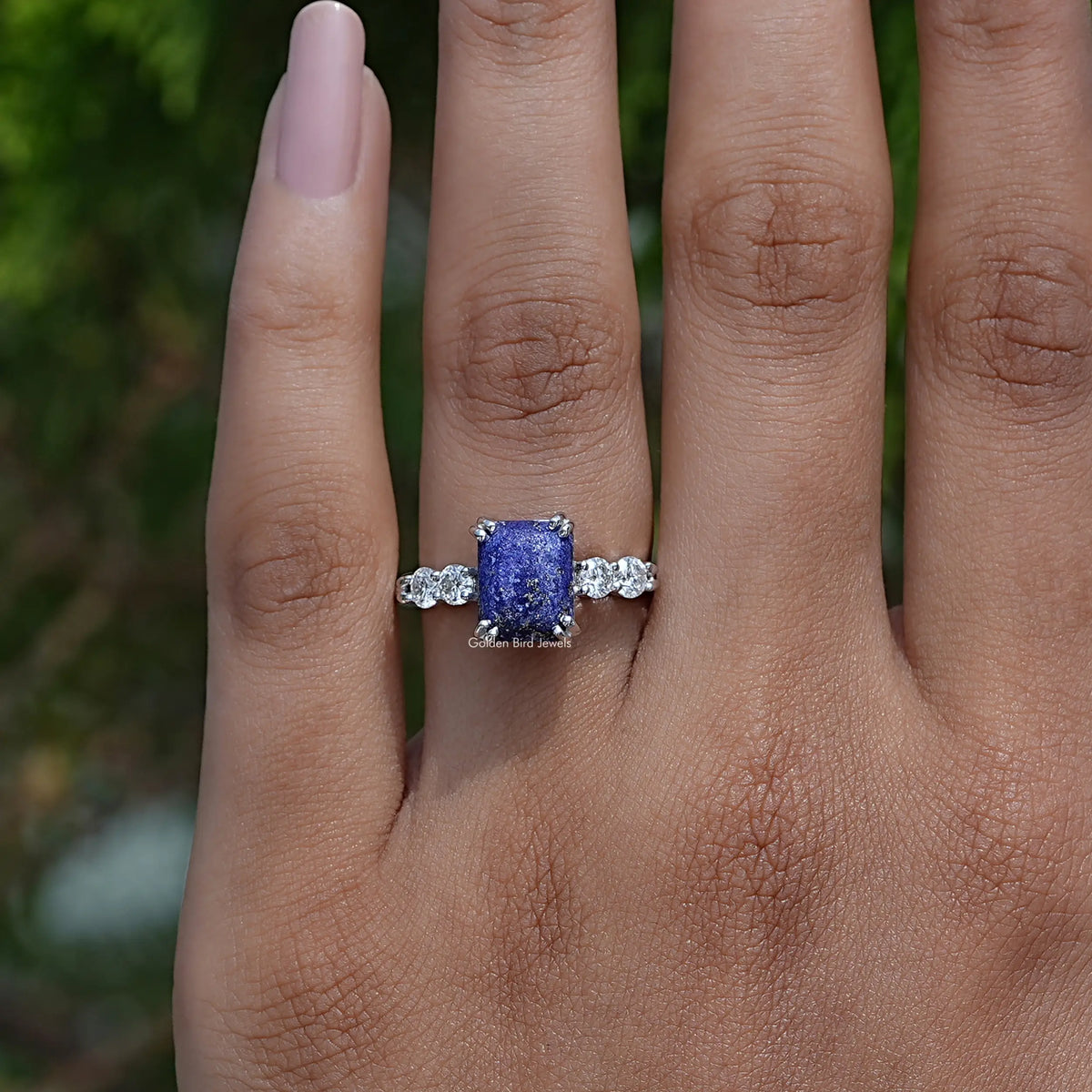Blue Emerald Cut Accent Stone Ring In White Gold