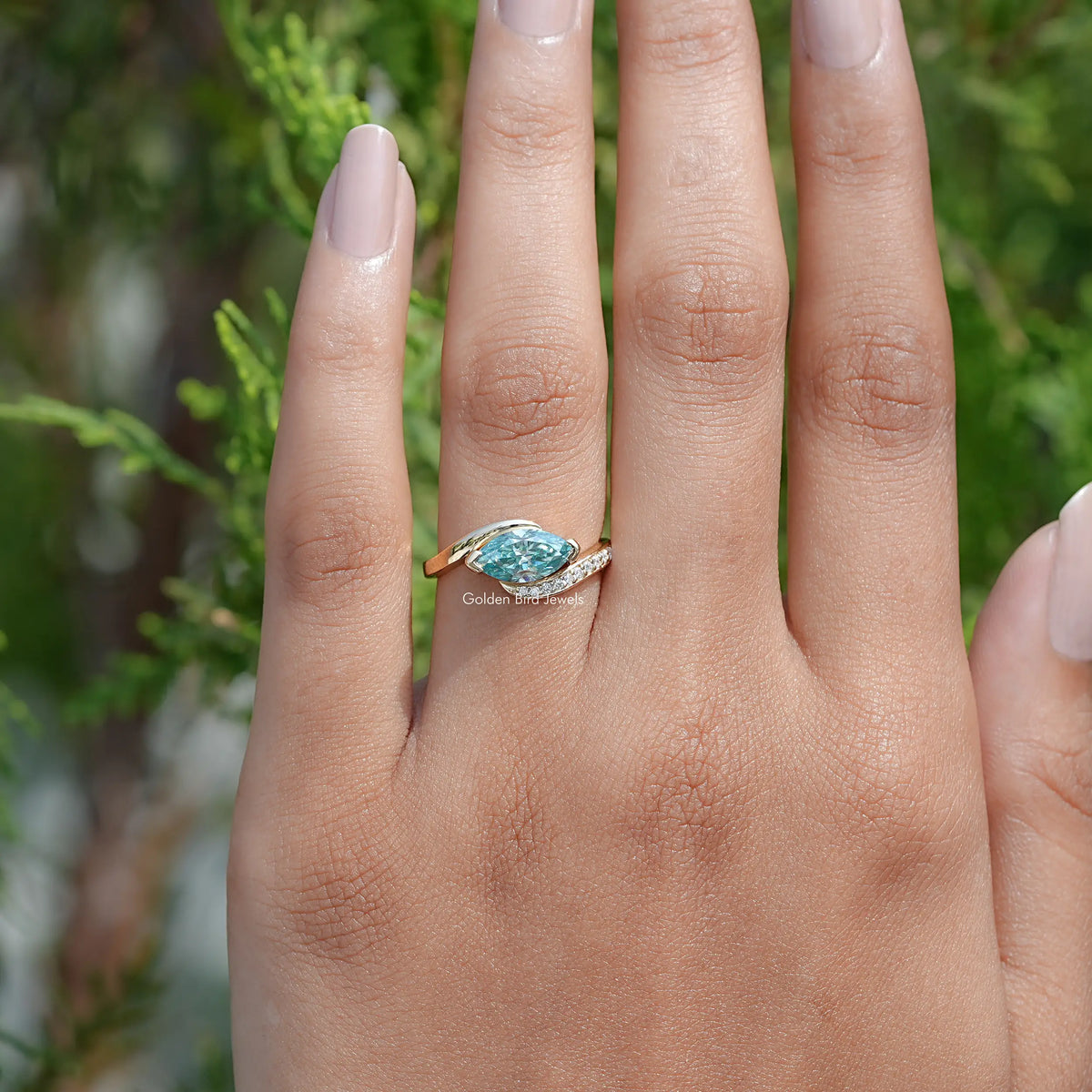 View of East West Blue Marquise Moissanite Bypass Ring 

