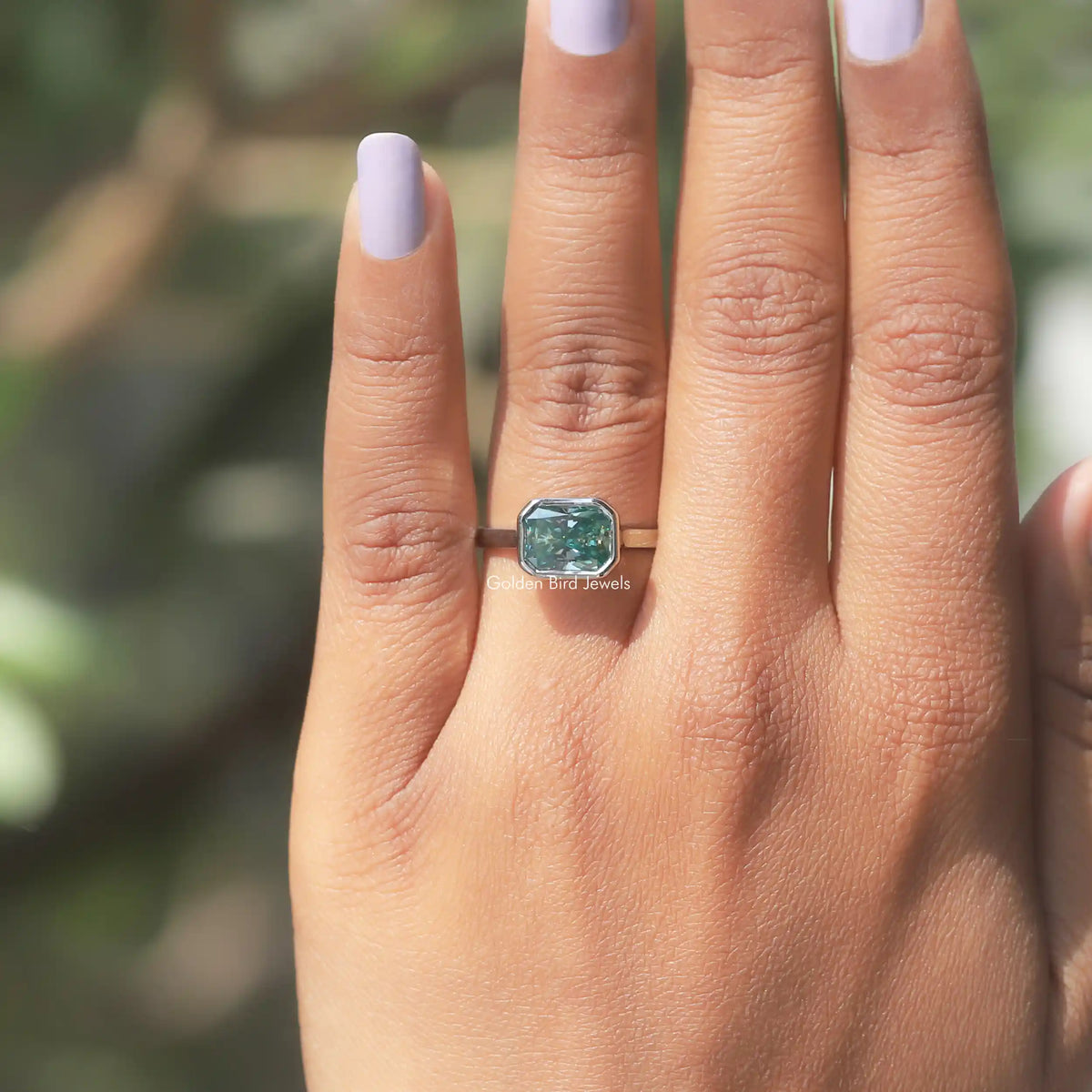 Detailed View Of Blue Moissanite Radiant Cut Ring In White Gold